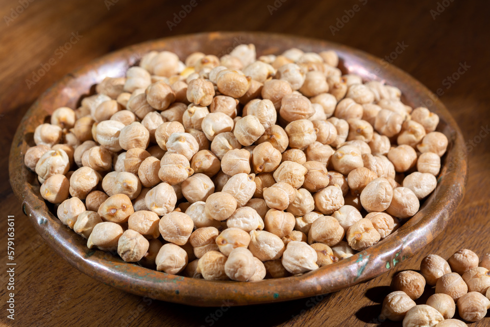 Portion of dried uncooked chick peas close up