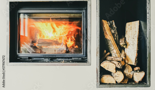 Photos Joli feu de Cheminée et stock de bois