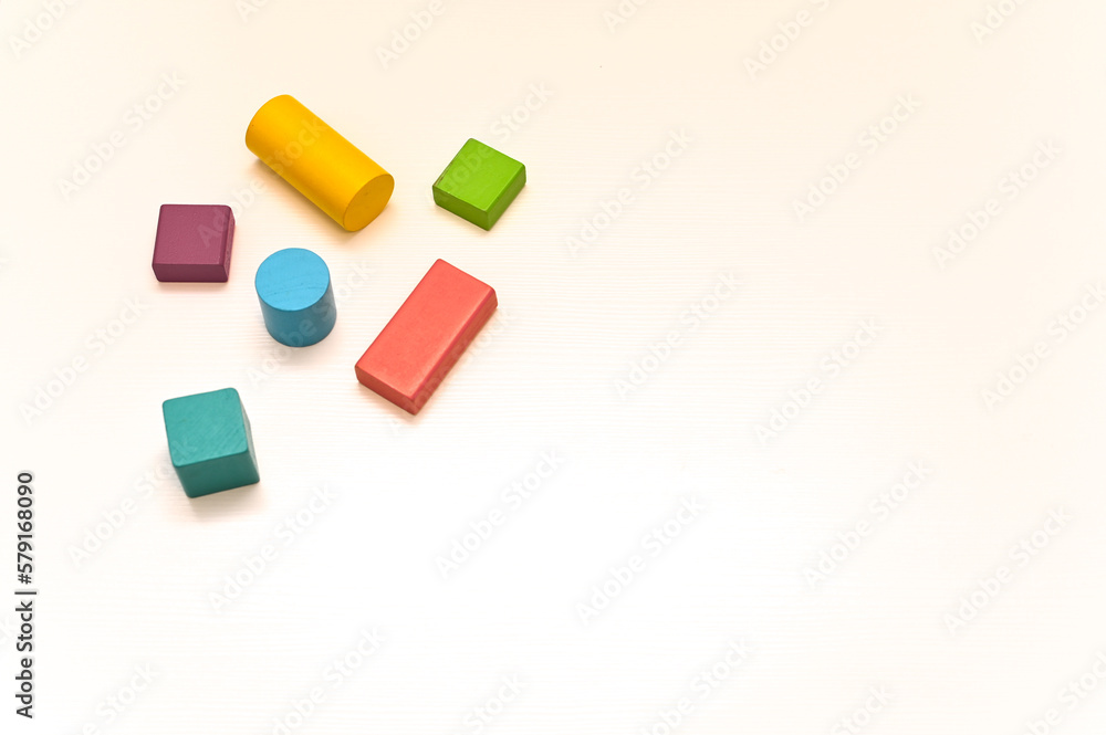 Multicolored wooden figures of different shapes. concept. empty space, Multicolored wooden figures of different shapes. concept. empty space,