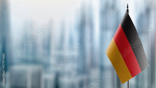 Small flags of the Germany on an abstract blurry background