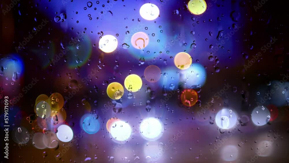 Rain Running Down A Window In A Storm In The City
