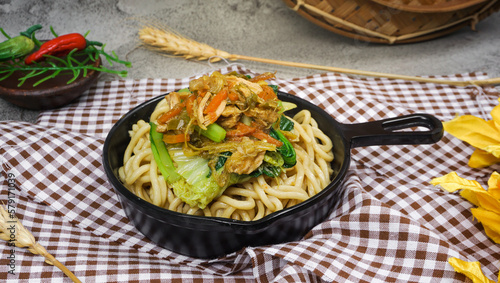 Mie Ayam Pangsit (Noodles with Chicken and vegetables ) is Indonesian popular food. photo