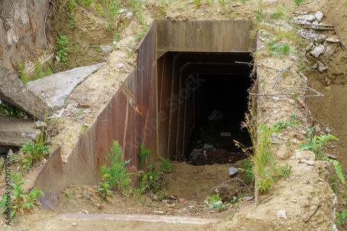 Spare entrance. Abandoned secret nuclear bunker. Cold War command post, object 1180. Background photo