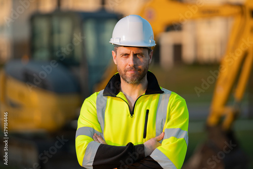 Fotografija Builder on excavator