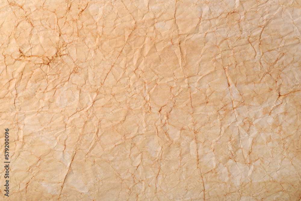 Sheet of old parchment paper as background, top view Sheet of old parchment paper as background, top view