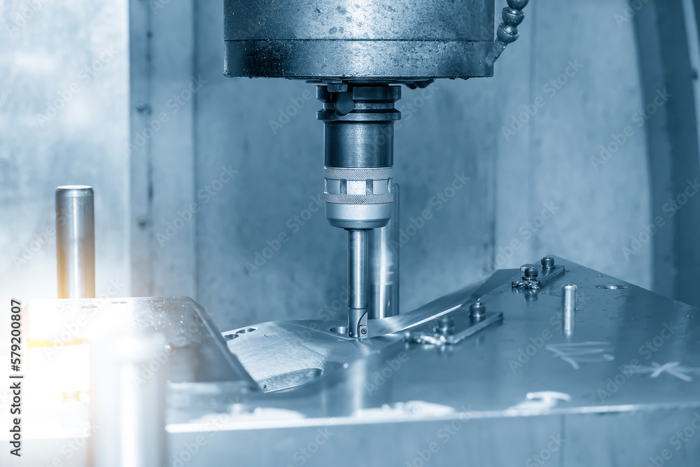 The CNC milling machine rough cutting the injection mold parts by indexable tools. The CNC milling machine rough cutting the injection mold parts by indexable tools.