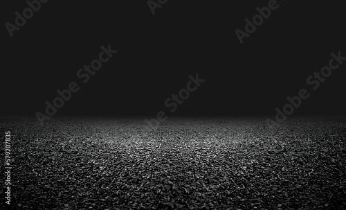 Black ground with spotlight in centre on darkness empty backdrop. Defocus distance closeup. Abstract illustration 3d template.