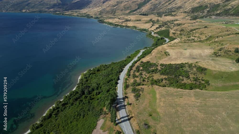 Scenic lake coastline road in New Zealand, aerial drone view Scenic lake coastline road in New Zealand, aerial drone view