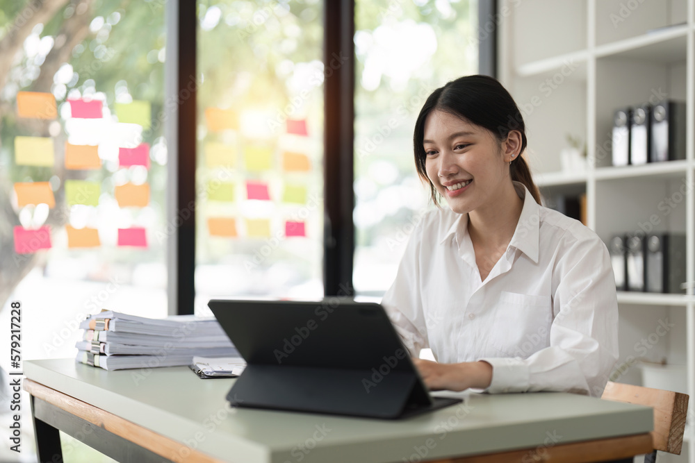 Accountant woman working on laptop and do document, tax, exchange, accounting and Financial advisor concept Accountant woman working on laptop and do document, tax, exchange, accounting and Financial advisor concept