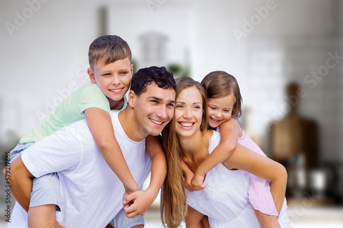 Happy young family with child posing