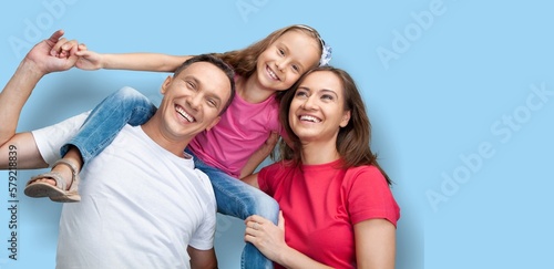 Happy young family with child posing © BillionPhotos.com