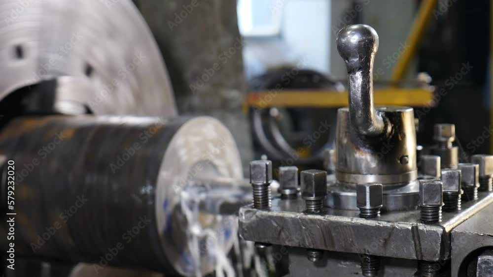 Producing derrick equipment, CNC Lathe Machine makes Metal Detail on Factory. rotating. Turning lathe at metal constructions factory. Heavy industry and metalwork. 4 k video Producing derrick equipment, CNC Lathe Machine makes Metal Detail on Factory. rotating. Turning lathe at metal constructions factory. Heavy industry and metalwork. 4 k video