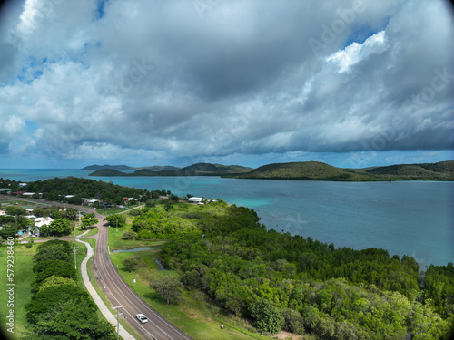 Aerial view of a road along side the ocean on a tropical island © AspectDrones