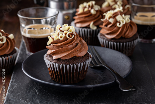 Fototapeta Dark chocolate coffee cupcakes with whipped coffee ganache frosting