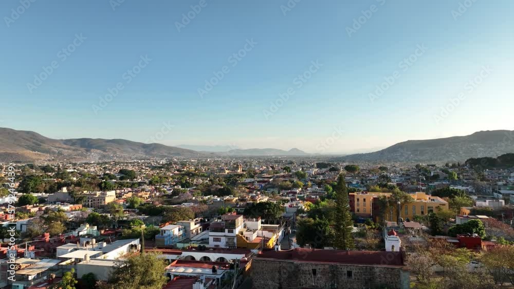 Aerial View of Oaxaca Mexico Cityscape Skyline, Homes and Streets Under Clear Blue Sky Aerial View of Oaxaca Mexico Cityscape Skyline, Homes and Streets Under Clear Blue Sky