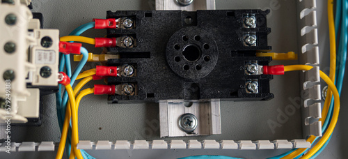 Cuadro en lienzo Electrical panel with contactors and wires close-up