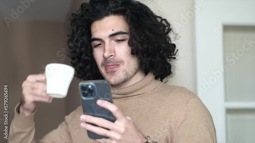 Wallpaper Mural Coffee, Laughter, and Connection: Young Caucasian Man Enjoying His Morning Routine Torontodigital.ca