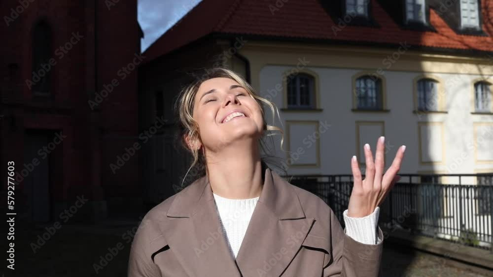 custom made wallpaper toronto digitalYoung charming woman on city street enjoys sunshine and warm spring day. Feeling of happiness. Stylish women. Rest and relaxation. Live in present moment. Walking through city streets.