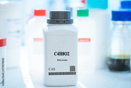 C4H8O2 ethyl acetate CAS  chemical substance in white plastic laboratory packaging photo