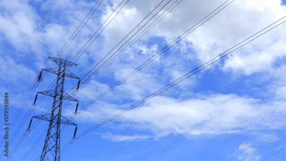power lines. blue sky with clouds. cloud timelipse bright blue sky background. white cloud hyperlipse. summer weather in the countryside. no people.
power lines. blue sky with clouds. cloud timelipse bright blue sky background. white cloud hyperlipse. summer weather in the countryside. no people.