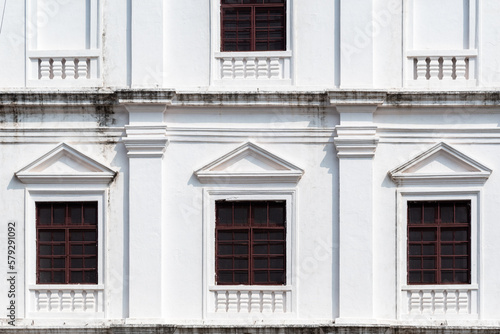 Detail of vintage rectangular windows of the ancient Portuguese era St. Francis of Assisi church in Old Goa.