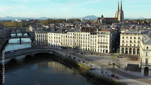 Bridges on river with cathedral in background, Bayonne city in  France. Aerial drone panoramic view and sky for copy space