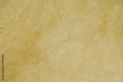 Light brown leather cut as background textured and wallpaper. Rustic style