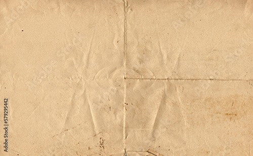 Vintage creased beige paper texture background. High Resolution	