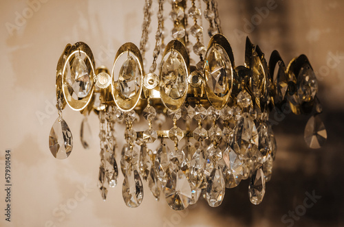 vintage golden chandelier on a dark background