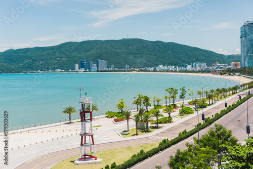 View of Quy Nhon city with a beautiful beach, long coastal route, clear blue sky, and high-rise hotels. Vietnam. Beautiful scenery in Vietnam	
 photo