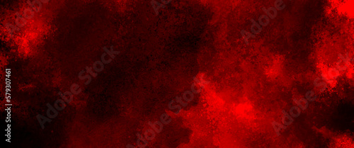 abstract red powder explosion on black background. abstract red powder splatted on black background. Freeze motion of red powder exploding.