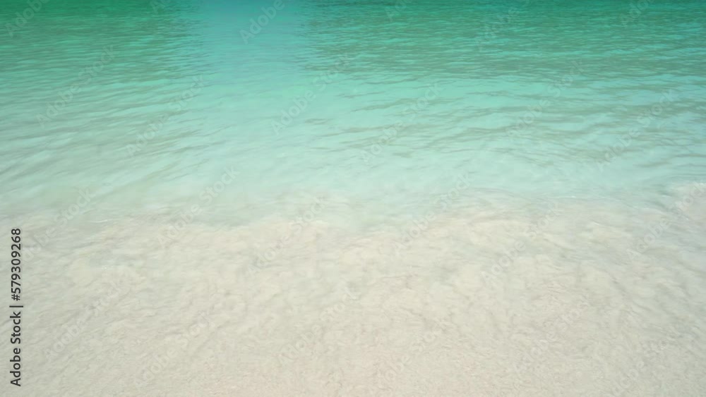 4K Video of Wave, Sand Beach, and Beautiful Crystal Clear Water at Maya Bay in Phi Islands National Park, A Popular Tourist Destination in Krabi, Southern of Thailand. 4K Video of Wave, Sand Beach, and Beautiful Crystal Clear Water at Maya Bay in Phi Islands National Park, A Popular Tourist Destination in Krabi, Southern of Thailand.