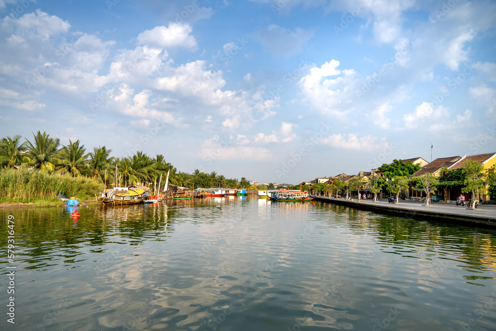 A boatings harbor serving tourists in the ancient town of Hoi An, Quang Nam Province, Vietnam
