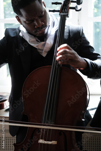 Cellist playing classical music on cello