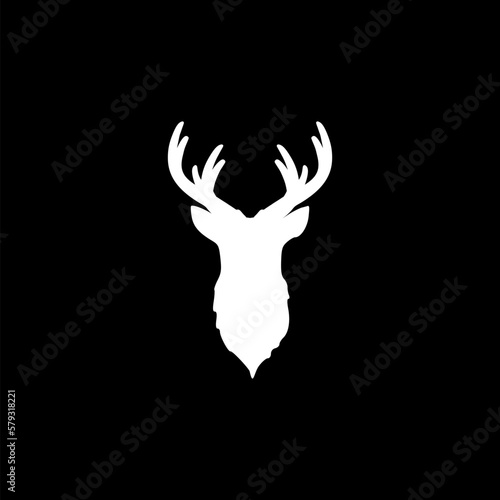 Deer graphic icon. Deer head sign isolated on black background.