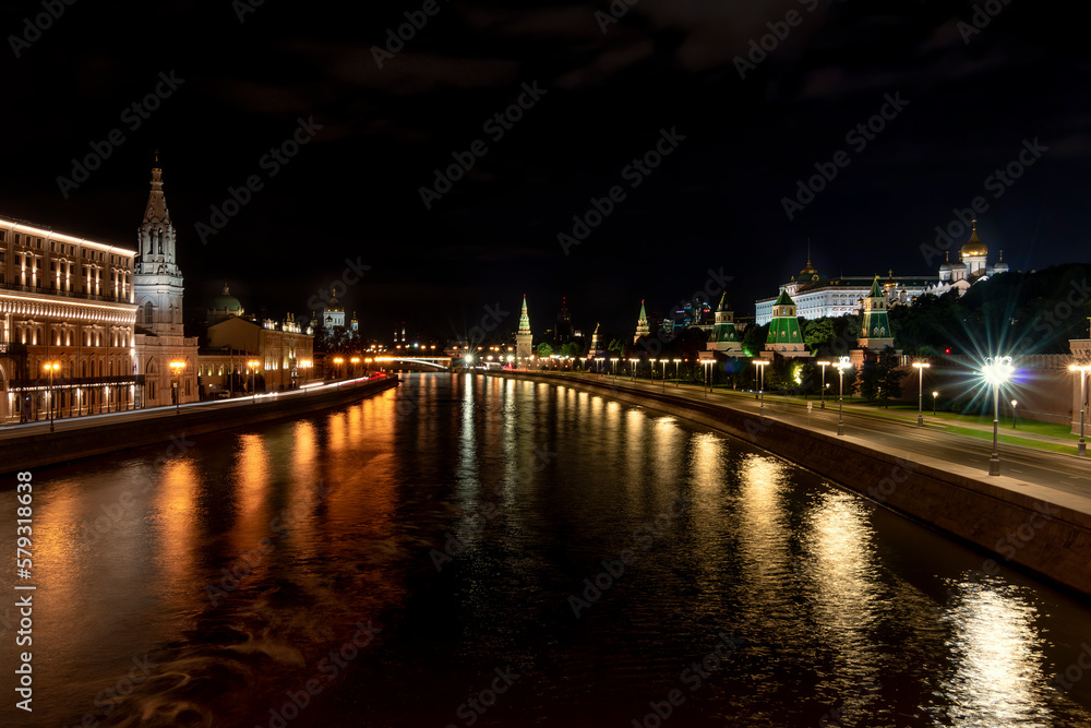 Long exposure night view of Moscow river, Embankment House, Kremlin, Lenin mausoleum,   Kazan Cathedral, Khmelnytsky Bridge, Temple of Christ the Savior and trailing lights , Moscow, Russia