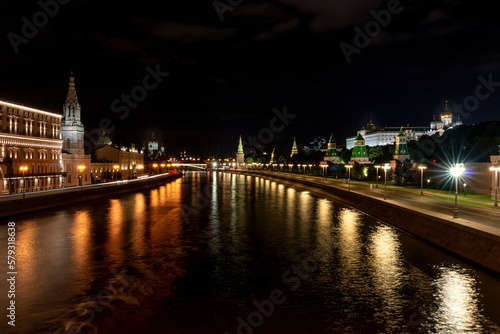 Long exposure night view of Moscow river, Embankment House, Kremlin, Lenin mausoleum, Kazan Cathedral, Khmelnytsky Bridge, Temple of Christ the Savior and trailing lights , Moscow, Russia