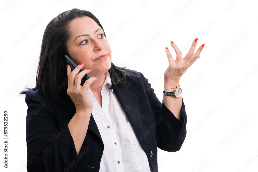 Female entrepreneur making confused gesture while talking phone Female entrepreneur making confused gesture while talking phone
