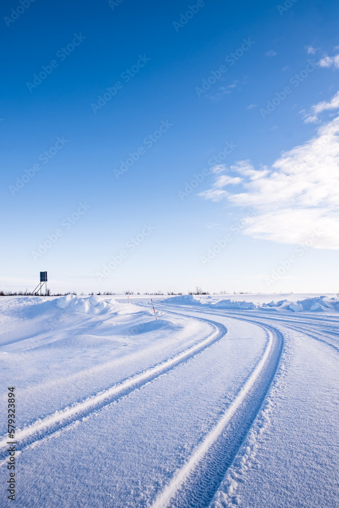 Vehicle Tyre Tracks In The Snow Around Utsjoki, Finland