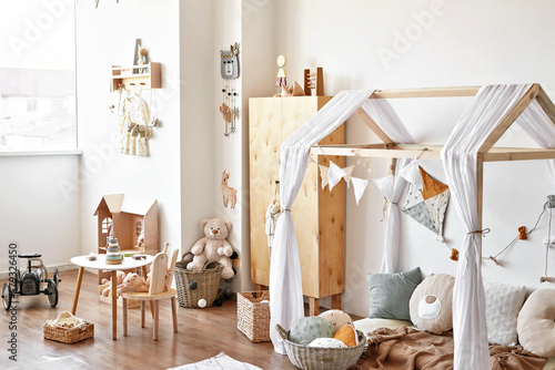 Nursery interior. Wooden toys in children's room