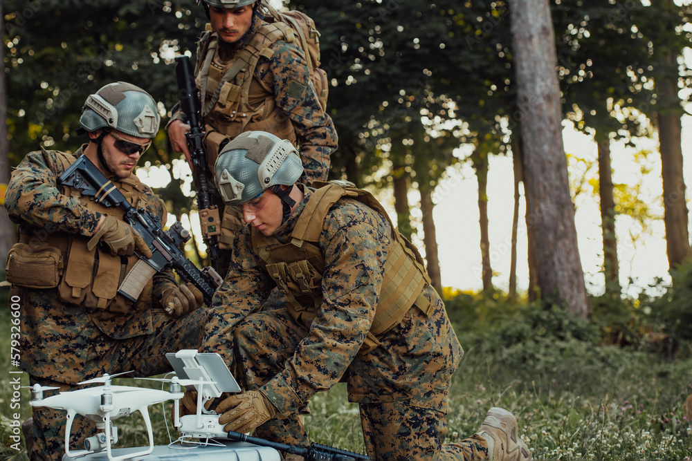 Modern Warfare Soldiers Squad are Using Drone for Scouting and Surveillance During Military Operation in the Forest.