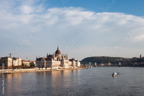 View on Budapest Parliament building across the river at daytime © Dina