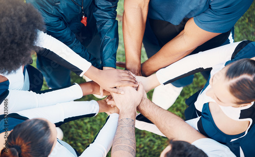 Fototapeta Naklejka Na Ścianę i Meble -  Above, hands and friends in sports huddle for support, collaboration or team building mission. Top view, people and hand connect for teamwork, motivation and cooperation, agreement and training goal