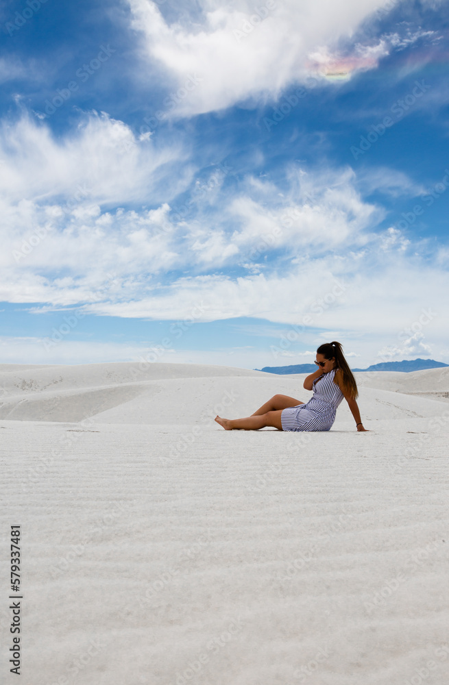 woman travelling in white sand desert