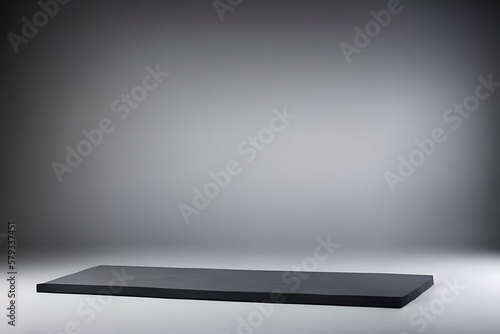 Thin black slate plinth against a grey background in a studio setting with soft light. Generative AI.