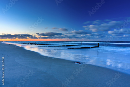 Fototapeta Naklejka Na Ścianę i Meble -  Beautiful Baltic sea beach on the Hel Peninsula at sunset. Poland