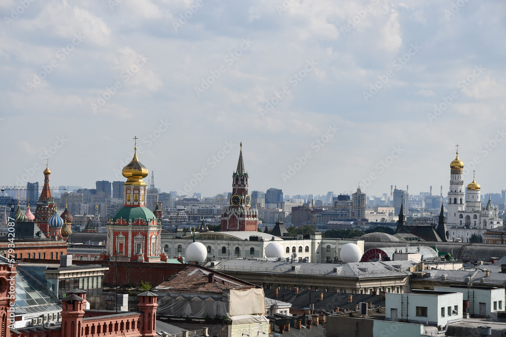 Aerial drone shot of the roofs in Moscow, Russia, with many towers and extravagant churches