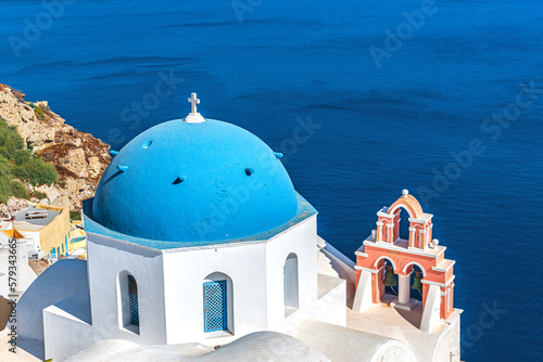 White dome and orange bell tower on the island of Santorini. Greece.