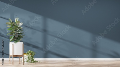 Fototapeta Naklejka Na Ścianę i Meble -  Plants against a dark blue wall mockup. dark blue wall mockup with wooden floor, plant and. 3d render