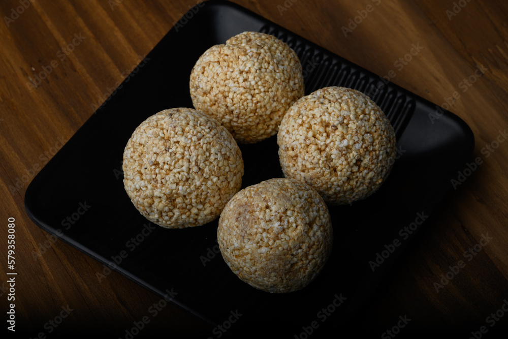 Amaranth laddu or Rajgira laddoo made using royal grain also called cholai spherical sweet balls Amaranth laddu or Rajgira laddoo made using royal grain also called cholai spherical sweet balls